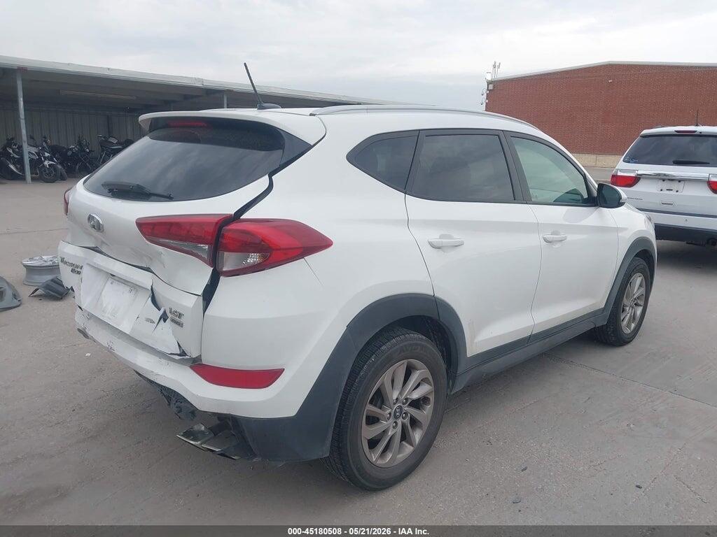 KM8J3CA24GU233620 2016 HYUNDAI TUCSON photo no. 4