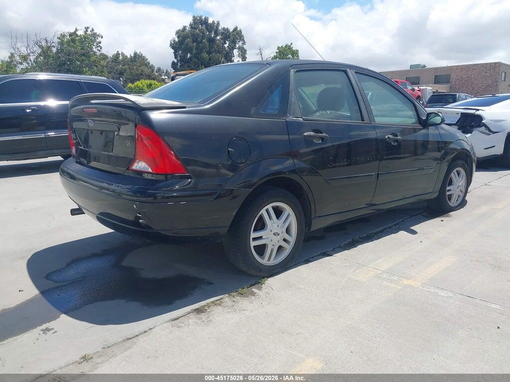 1FAFP3437YW170527 2000 FORD FOCUS photo no. 4