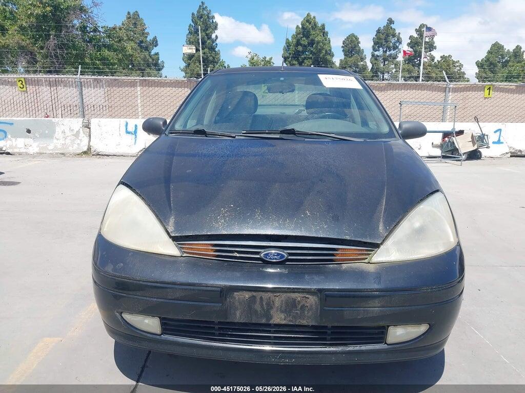 1FAFP3437YW170527 2000 FORD FOCUS photo no. 6