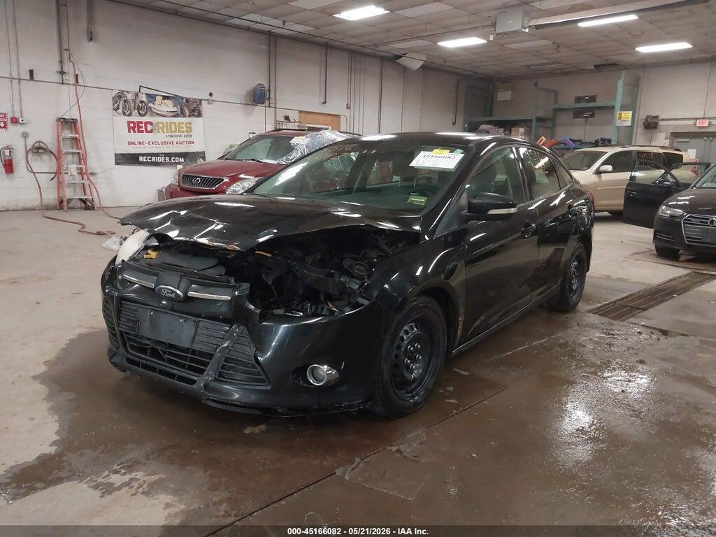 1FAHP3F24CL218783 2012 FORD FOCUS photo no. 2