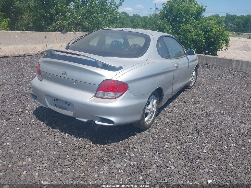 KMHJG35F81U252602 2001 HYUNDAI TIBURON photo no. 4