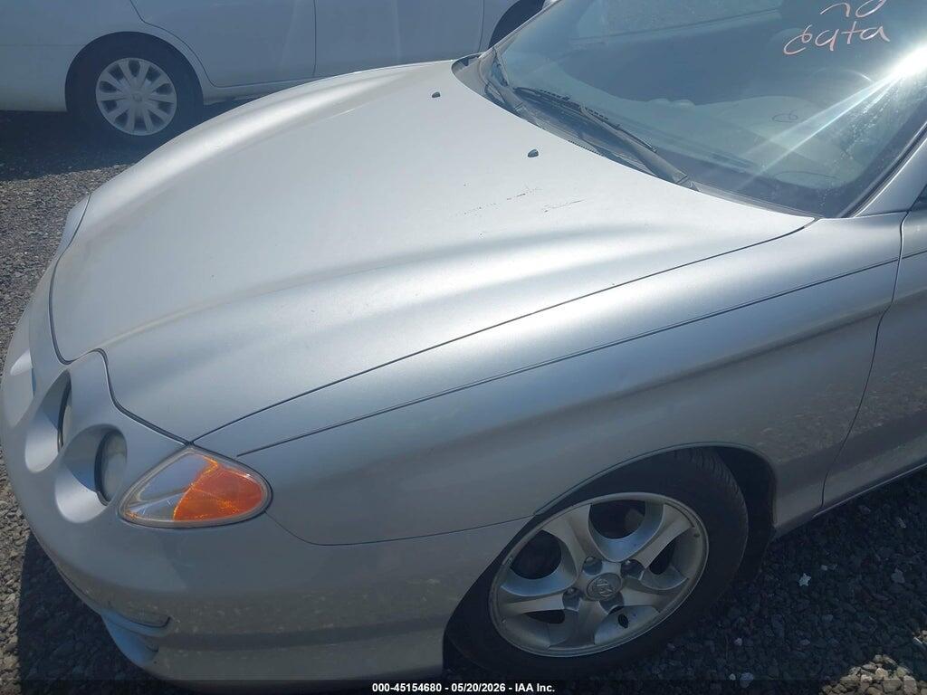 KMHJG35F81U252602 2001 HYUNDAI TIBURON photo no. 6