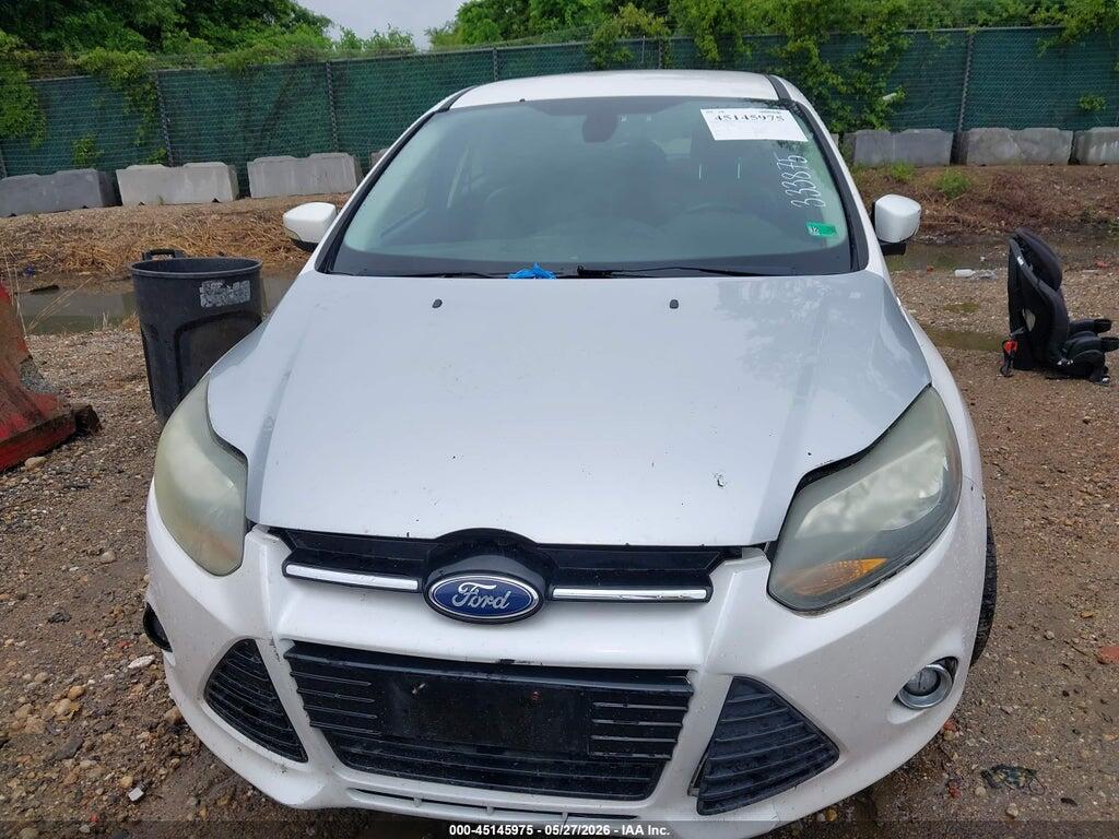 1FAHP3N21CL333875 2012 FORD FOCUS photo no. 12