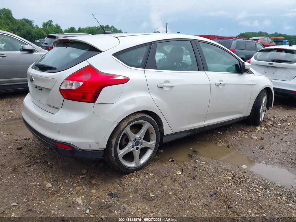 1FAHP3N21CL333875 2012 FORD FOCUS photo no. 4