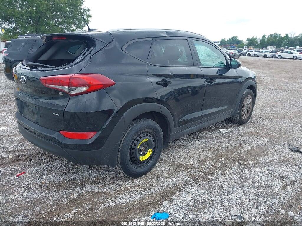 KM8J3CA40GU156875 2016 HYUNDAI TUCSON photo no. 4