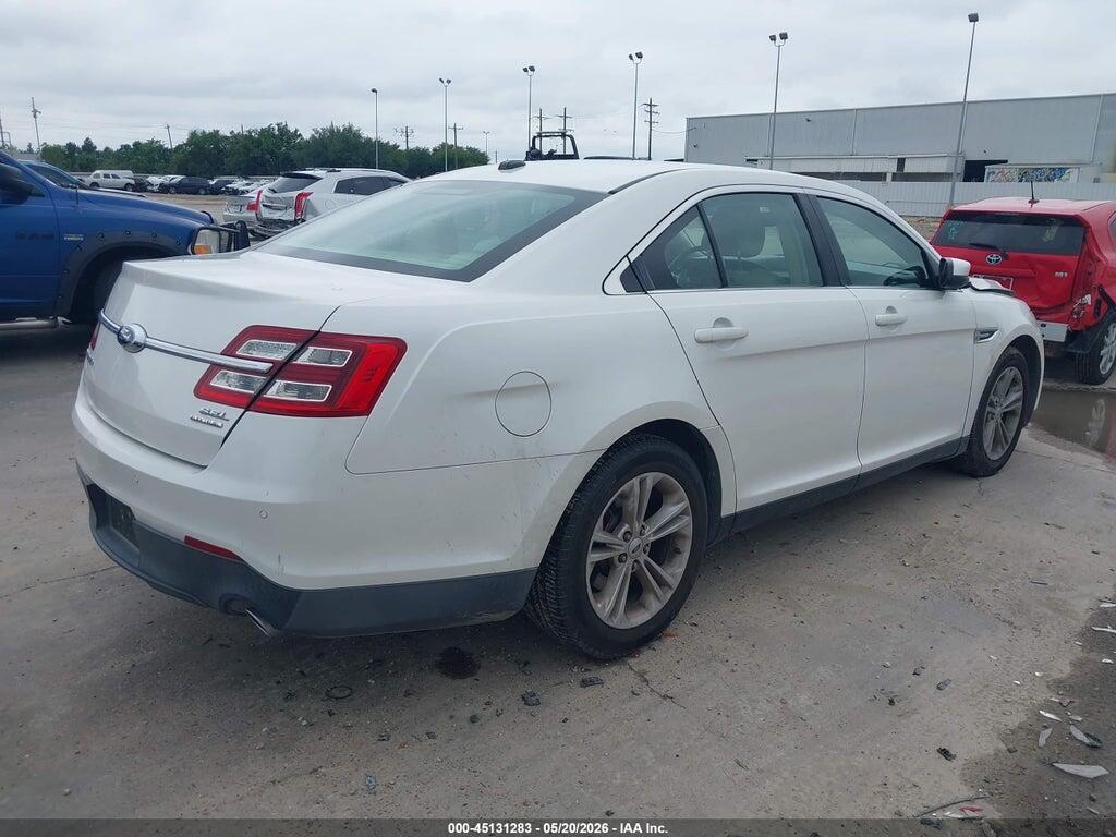 1FAHP2E84EG121014 2014 FORD TAURUS photo no. 4
