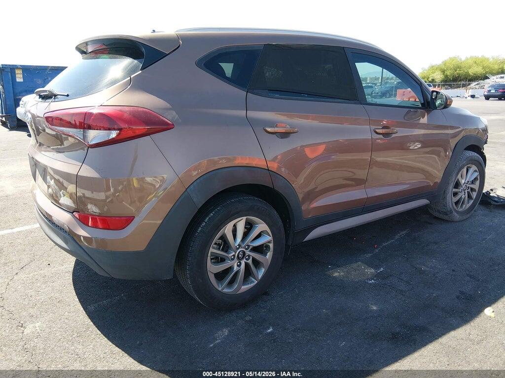 KM8J33A40HU487067 2017 HYUNDAI TUCSON photo no. 4