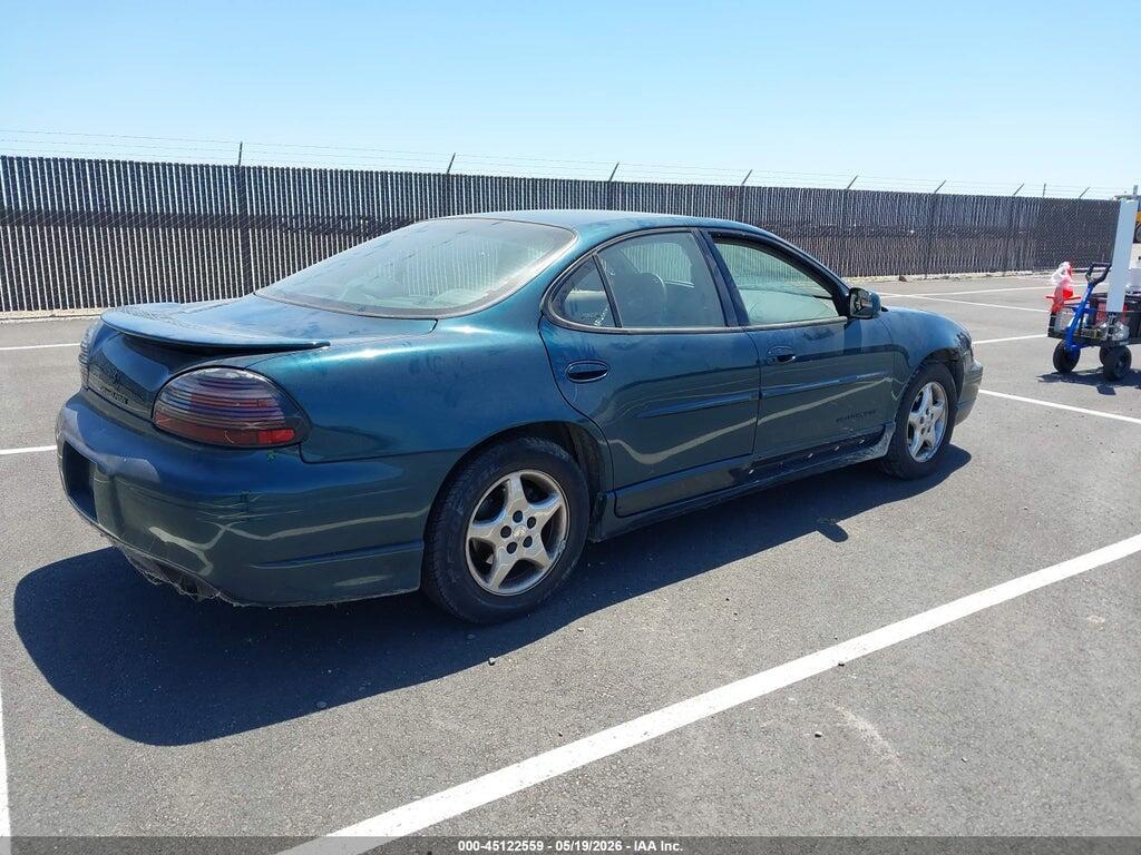 1G2WP52K5VF310414 1997 PONTIAC GRAND PRIX photo no. 4