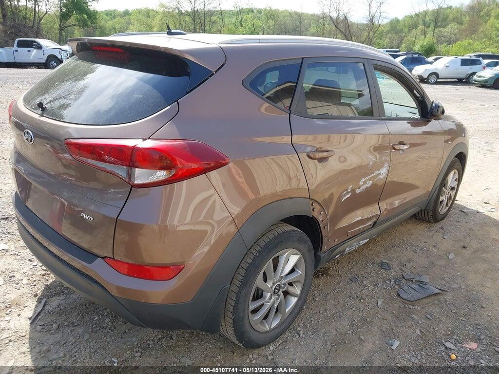 KM8J3CA47GU060564 2016 HYUNDAI TUCSON photo no. 4