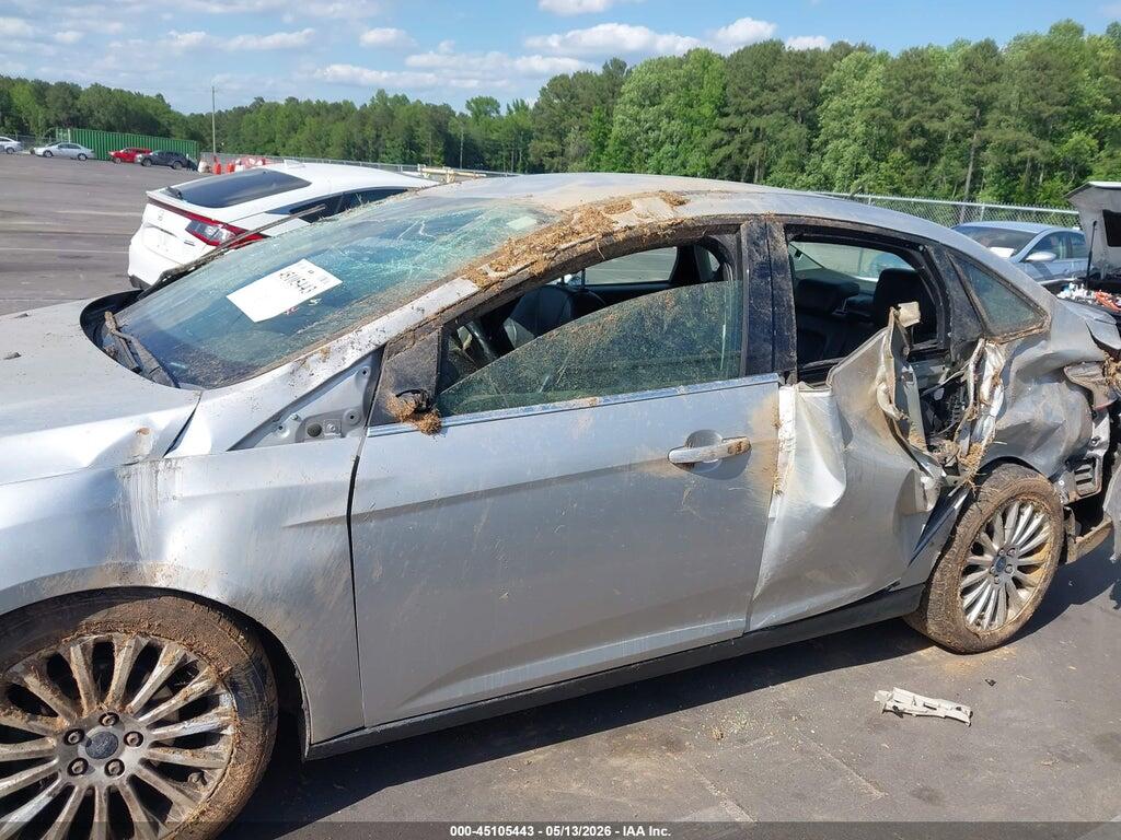 1FAHP3J23CL479846 2012 FORD FOCUS photo no. 6