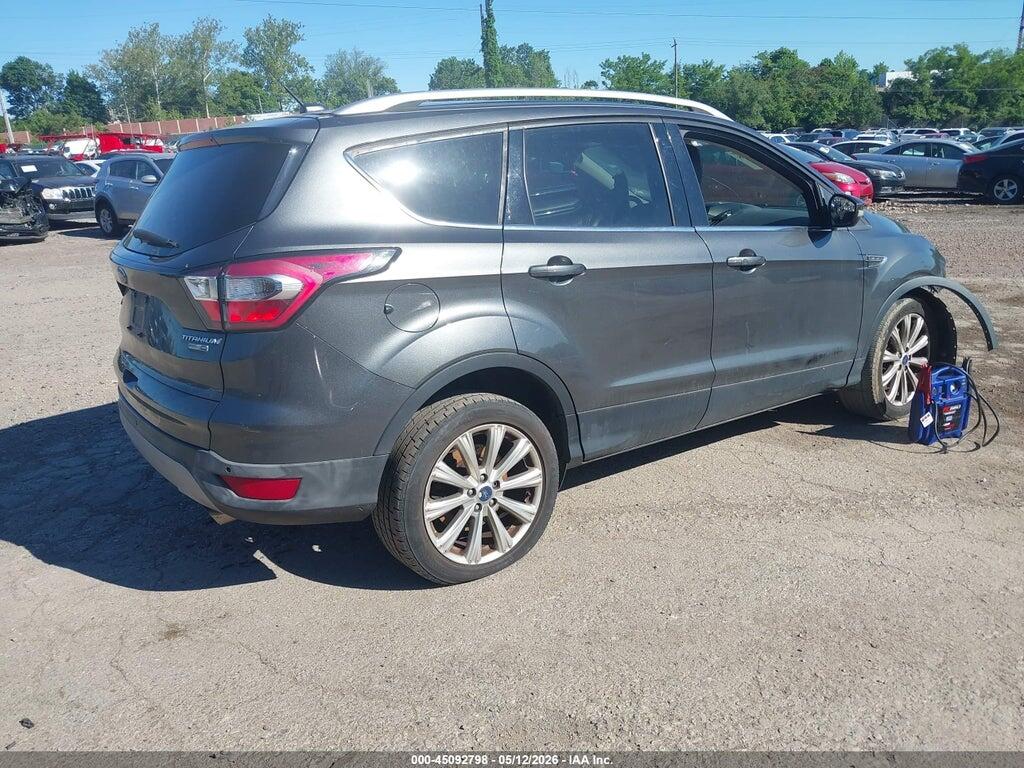 1FMCU9J96HUC99173 2017 FORD ESCAPE photo no. 4