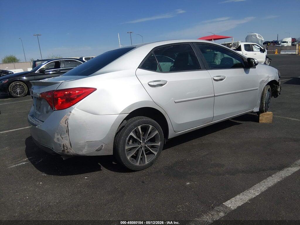 5YFBURHE7JP798909 2018 TOYOTA COROLLA photo no. 4