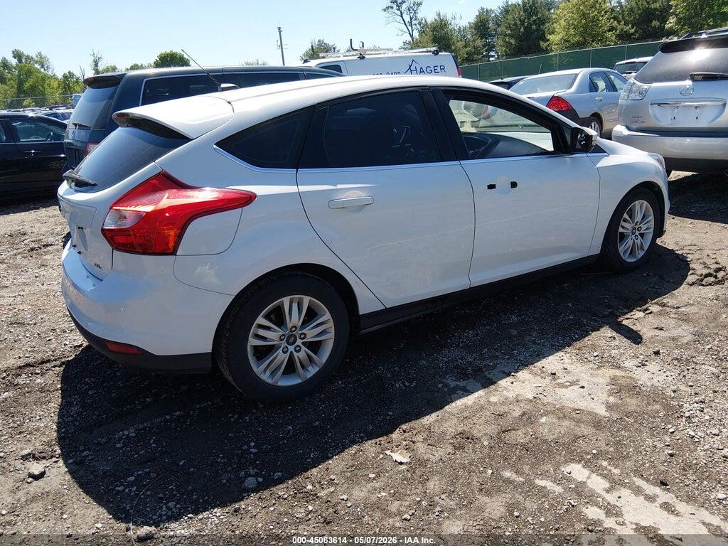 1FAHP3M25CL348462 2012 FORD FOCUS photo no. 4