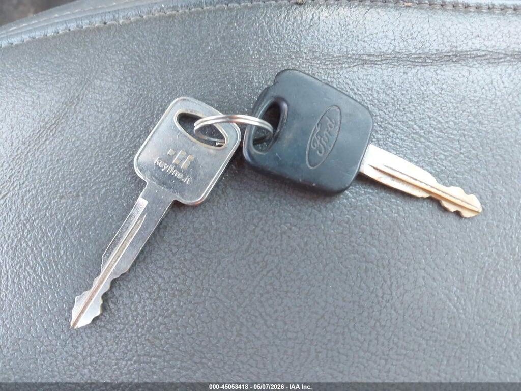3FAFP37Z24R101533 2004 FORD FOCUS photo no. 11