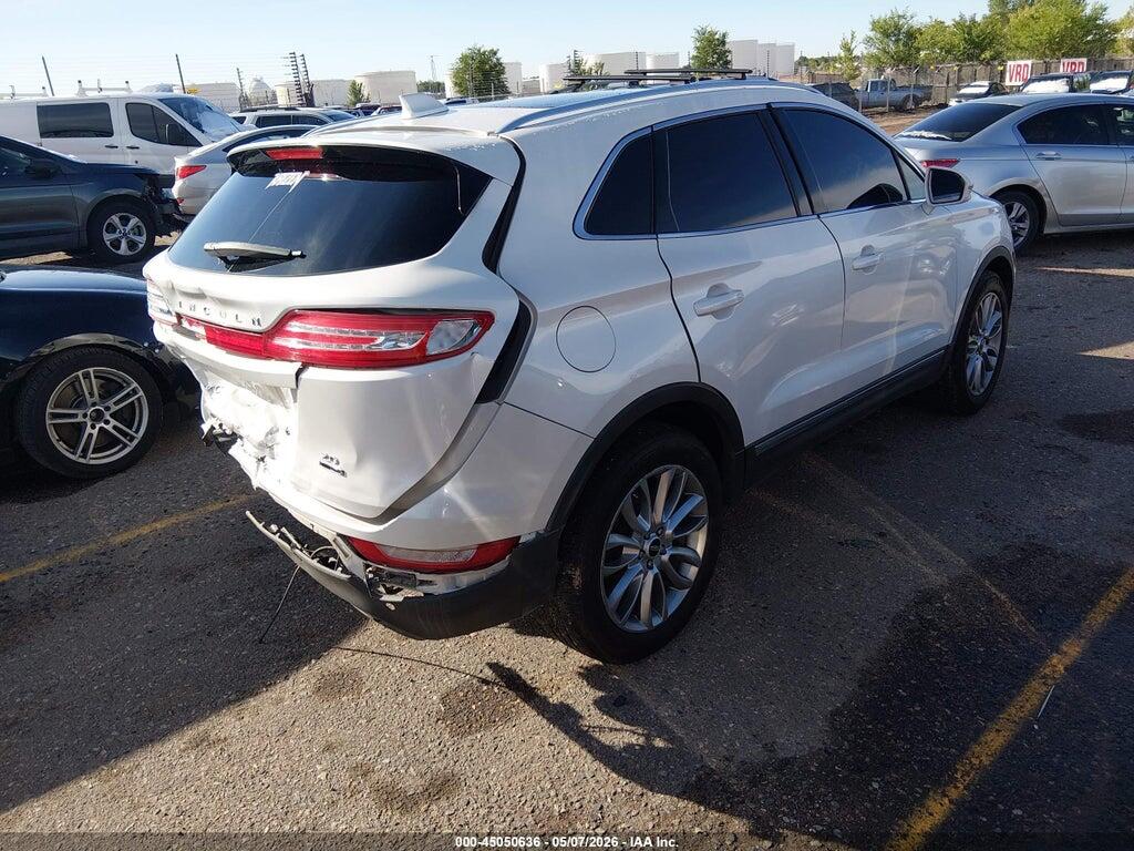 5LMCJ1A90FUJ26530 2015 LINCOLN MKC photo no. 4
