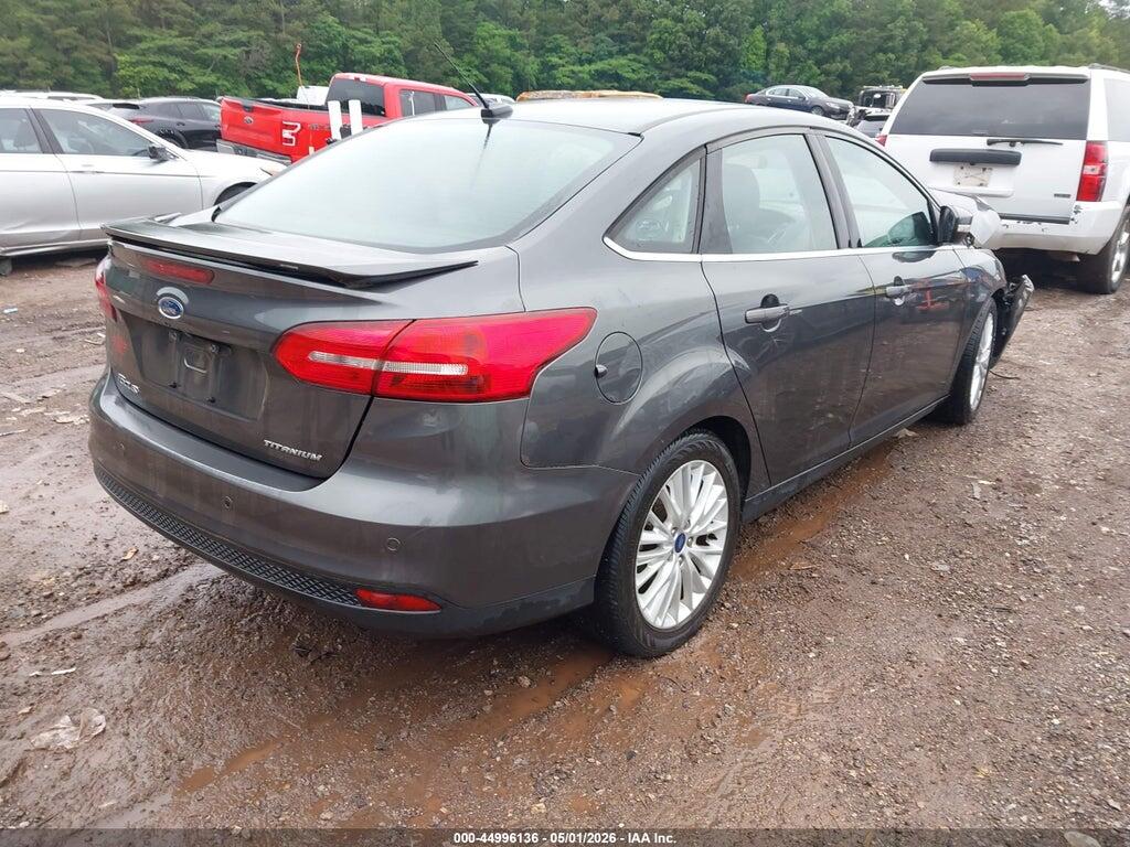 1FADP3J29HL326877 2017 FORD FOCUS photo no. 4
