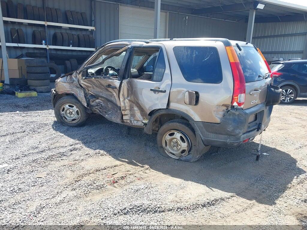 JHLRD68434C004427 2004 HONDA CR-V photo no. 6