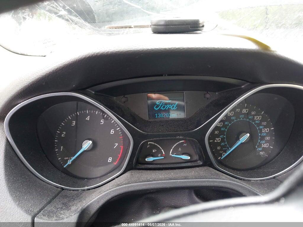 1FAHP3K21CL318913 2012 FORD FOCUS photo no. 7