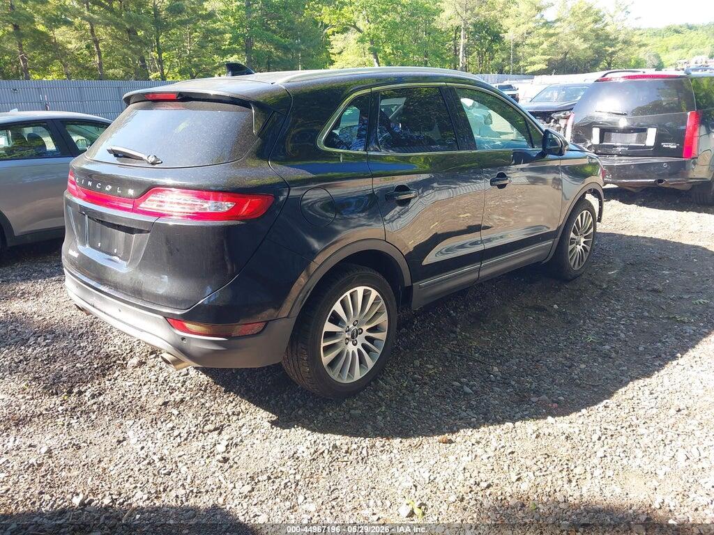 5LMCJ3D90HUL34143 2017 LINCOLN MKC photo no. 4