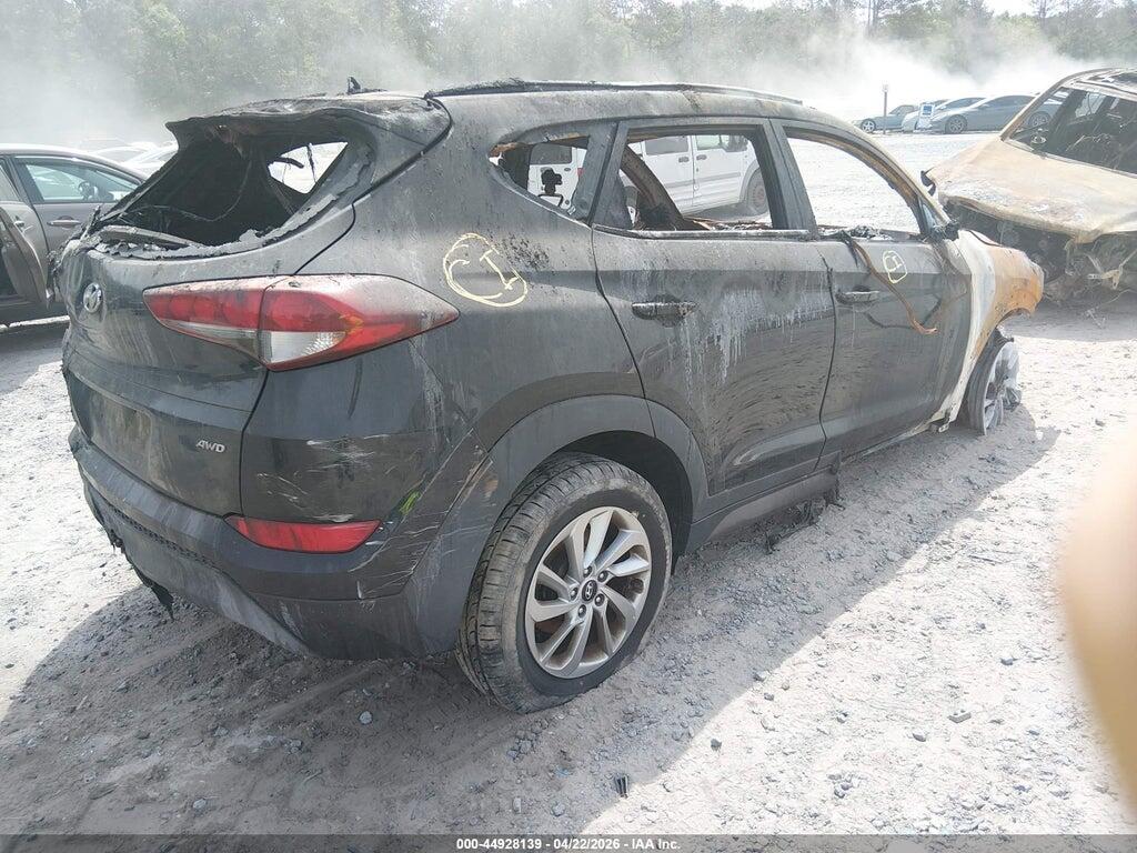 KM8J3CA48GU195908 2016 HYUNDAI TUCSON photo no. 4