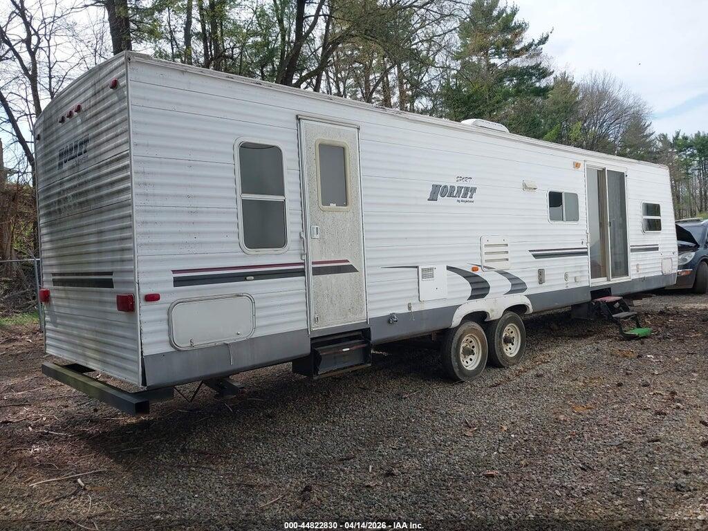 4YDT36B245E316790 2005 KEYSTONE HORNET SPORT SERIES photo no. 4
