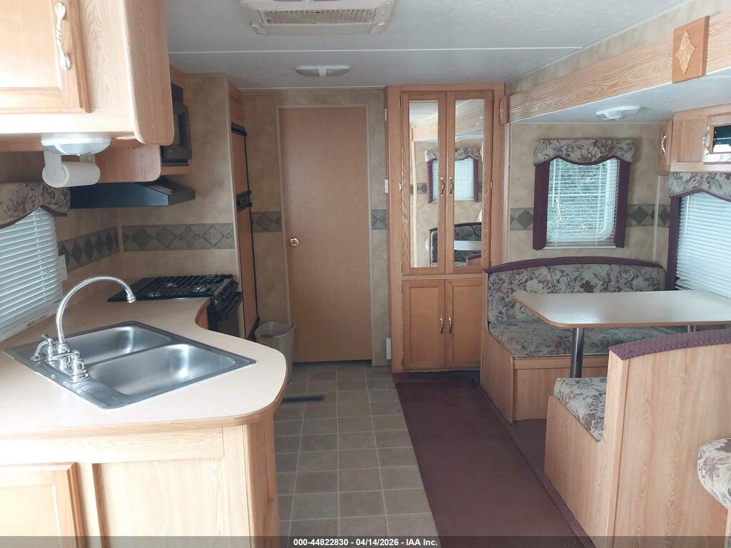 4YDT36B245E316790 2005 KEYSTONE HORNET SPORT SERIES photo no. 5
