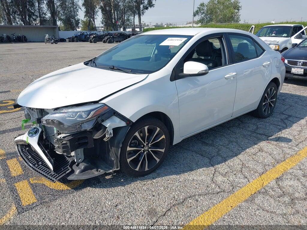 5YFBURHE3JP756088 2018 TOYOTA COROLLA photo no. 2