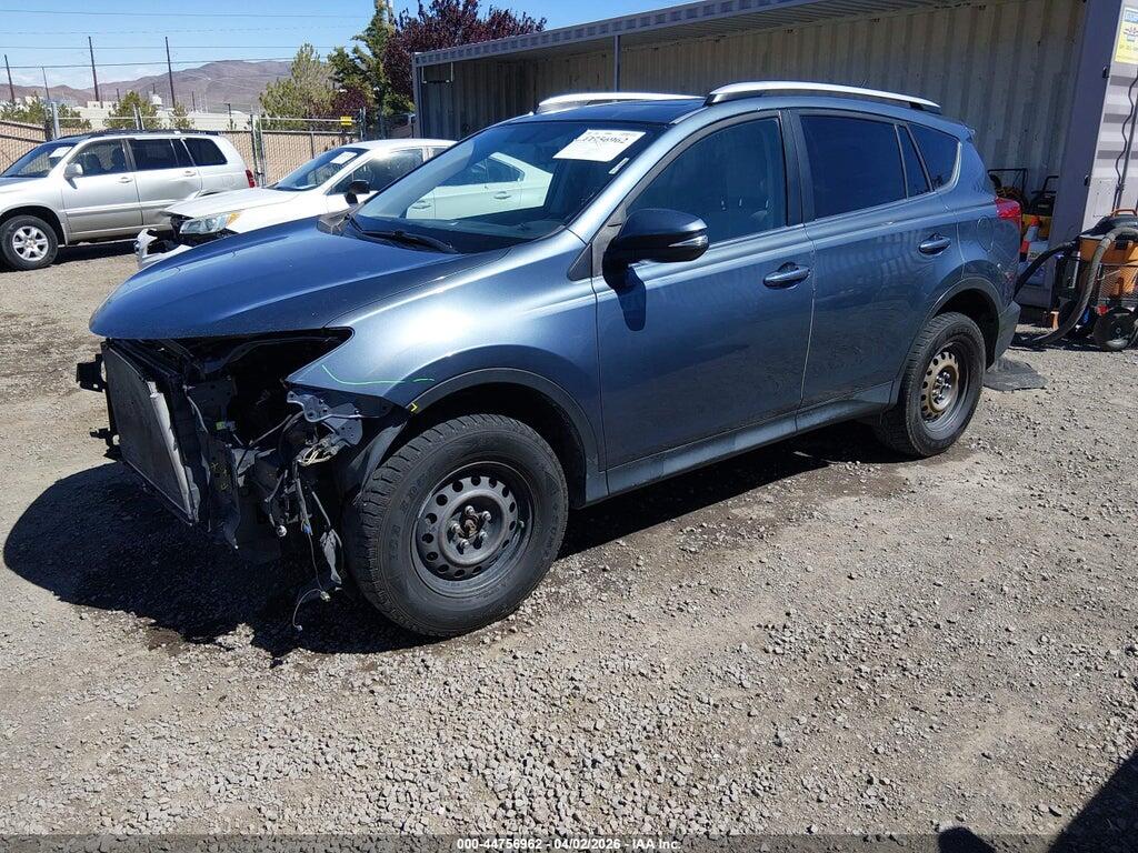 2T3RFREV1EW139703 2014 TOYOTA RAV4 photo no. 2