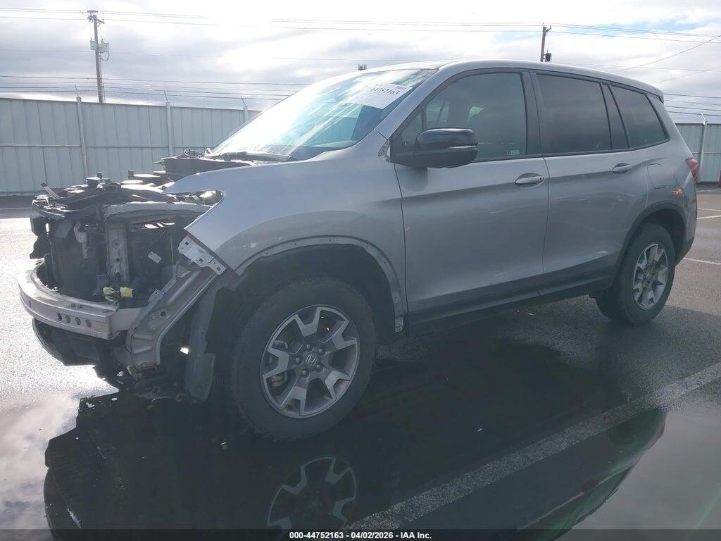 5FNYF8H68PB022591 2023 HONDA PASSPORT photo no. 2