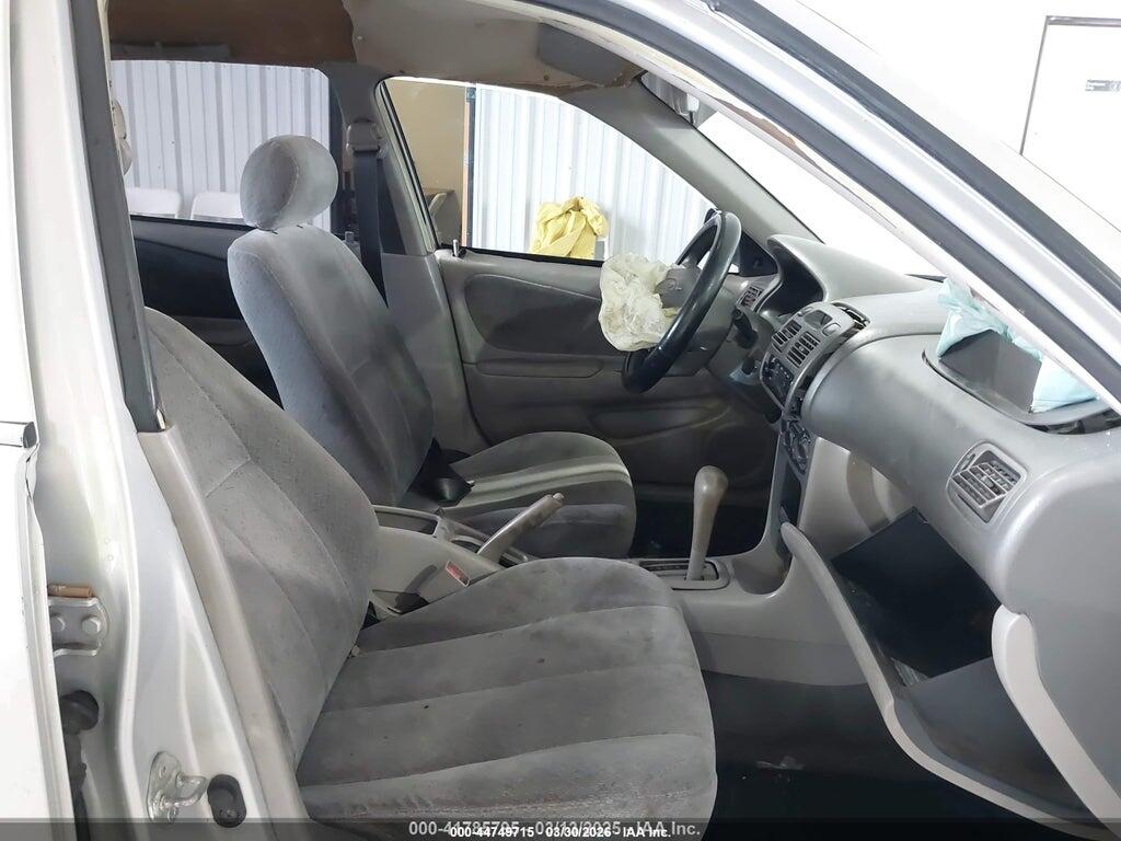 1NXBR12E1YZ409850 2000 TOYOTA COROLLA photo no. 5