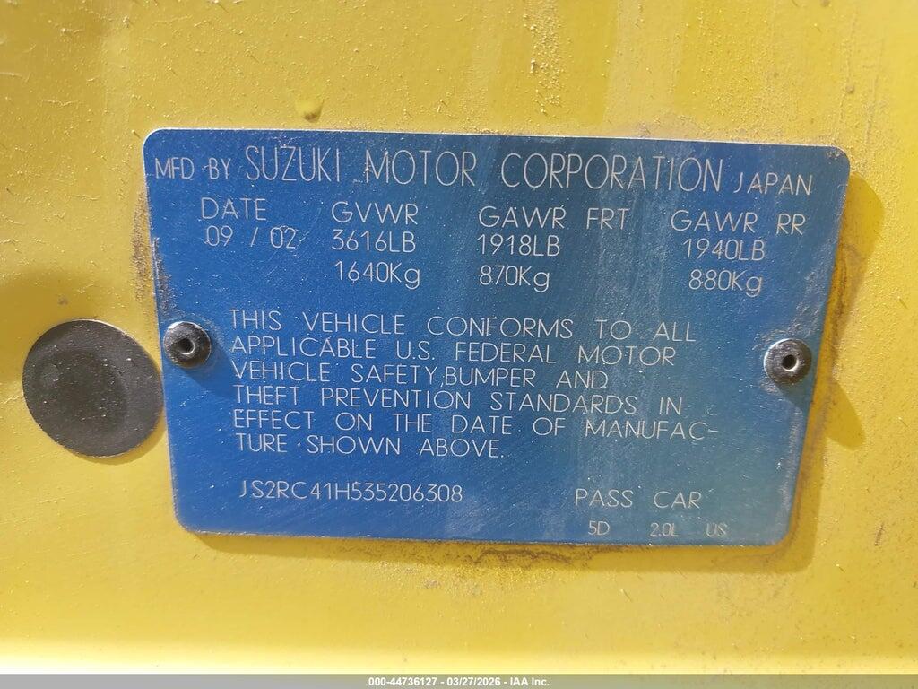 JS2RC41H535206308 2003 SUZUKI AERIO SX photo no. 9