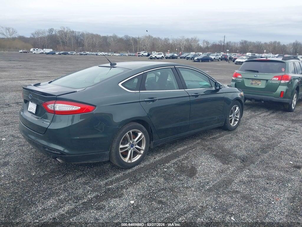 3FA6P0RU1FR156056 2015 FORD FUSION HYBRID photo no. 4