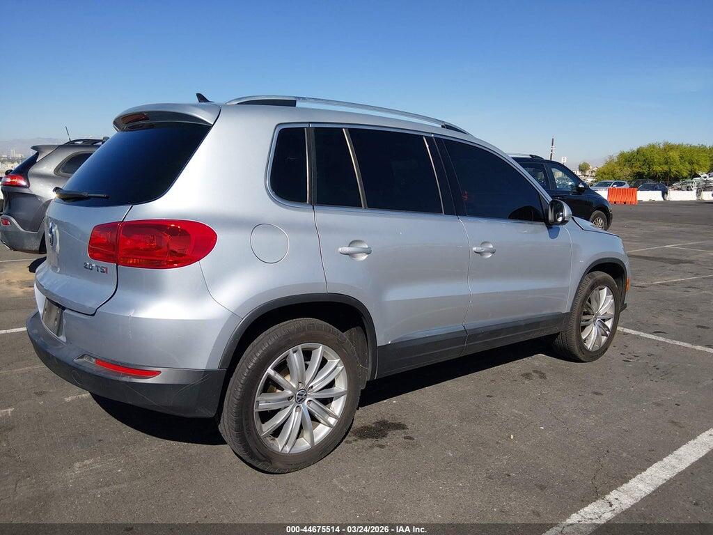 WVGAV3AXXEW599640 2014 VOLKSWAGEN TIGUAN photo no. 4