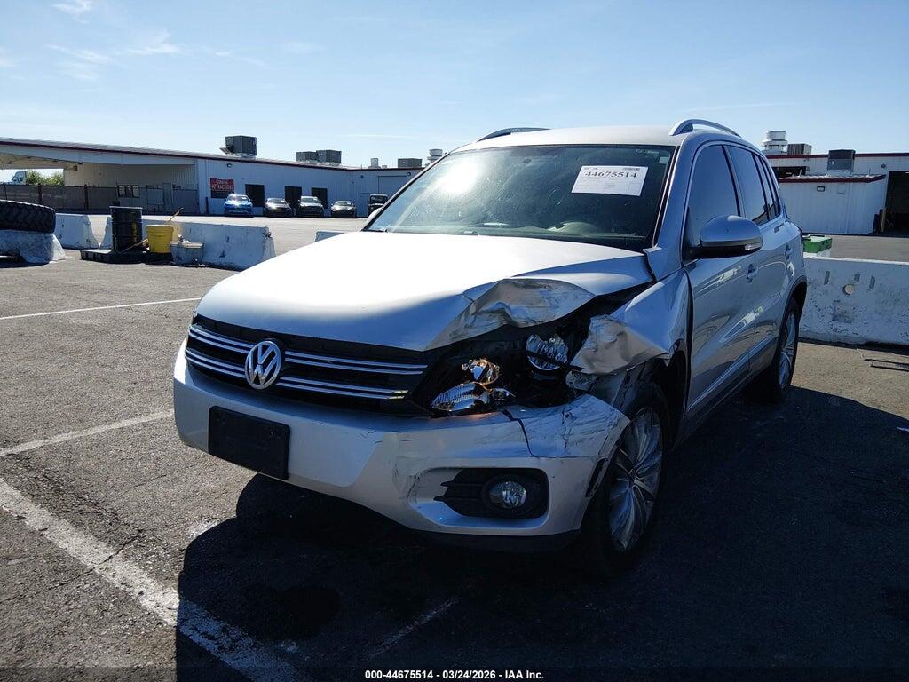 WVGAV3AXXEW599640 2014 VOLKSWAGEN TIGUAN photo no. 6