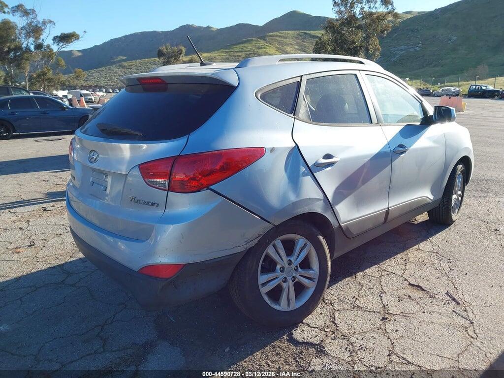 KM8JU3AC2BU257994 2011 HYUNDAI TUCSON photo no. 4