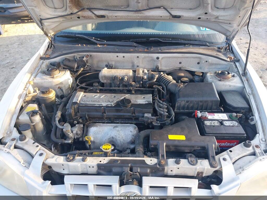 KMHCG45CX2U398537 2002 HYUNDAI ACCENT photo no. 10