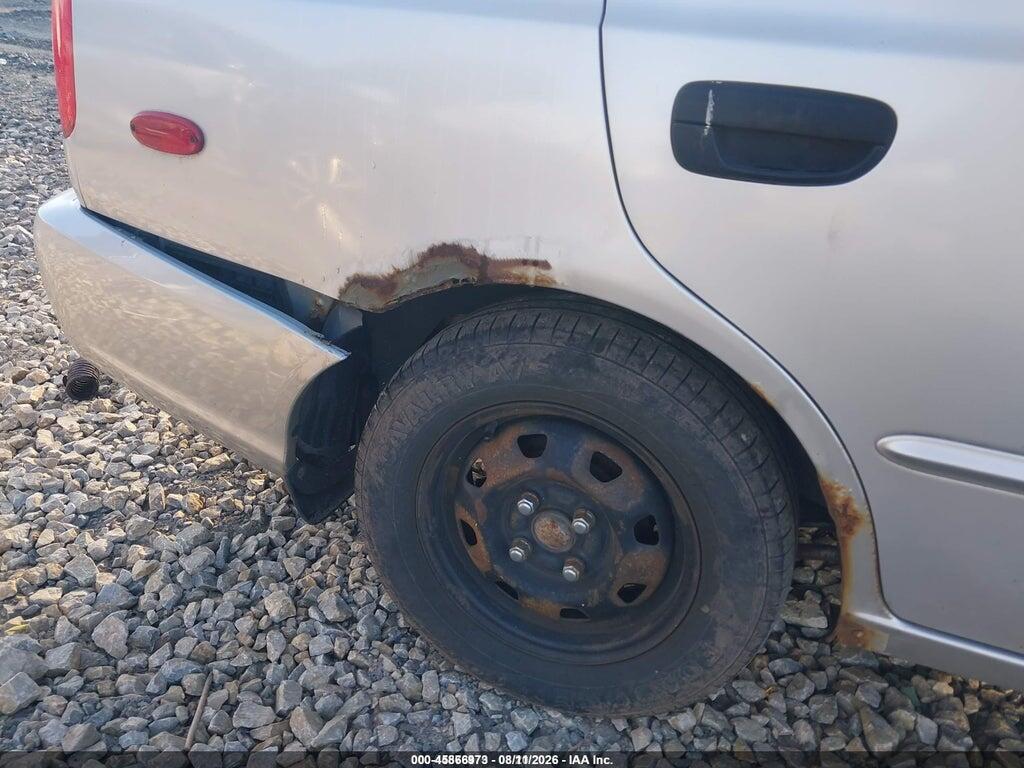 KMHCG45CX2U398537 2002 HYUNDAI ACCENT photo no. 6