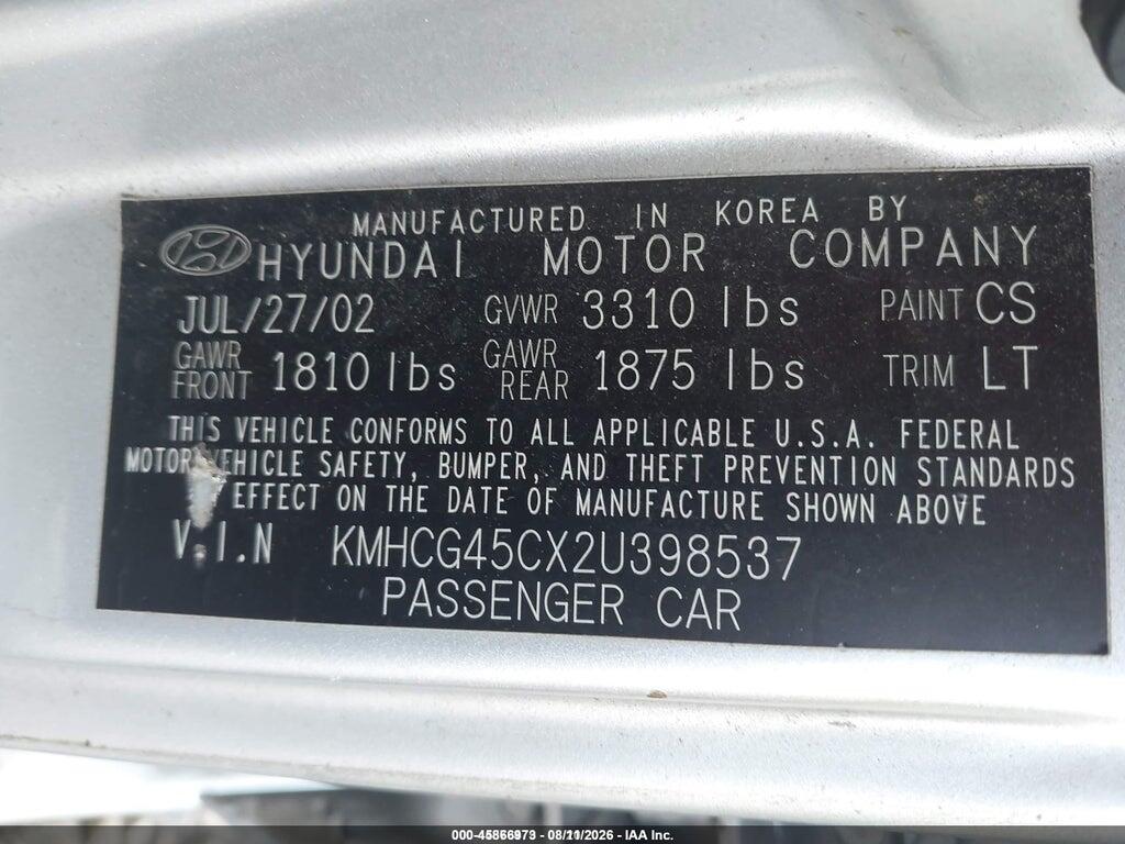 KMHCG45CX2U398537 2002 HYUNDAI ACCENT photo no. 9
