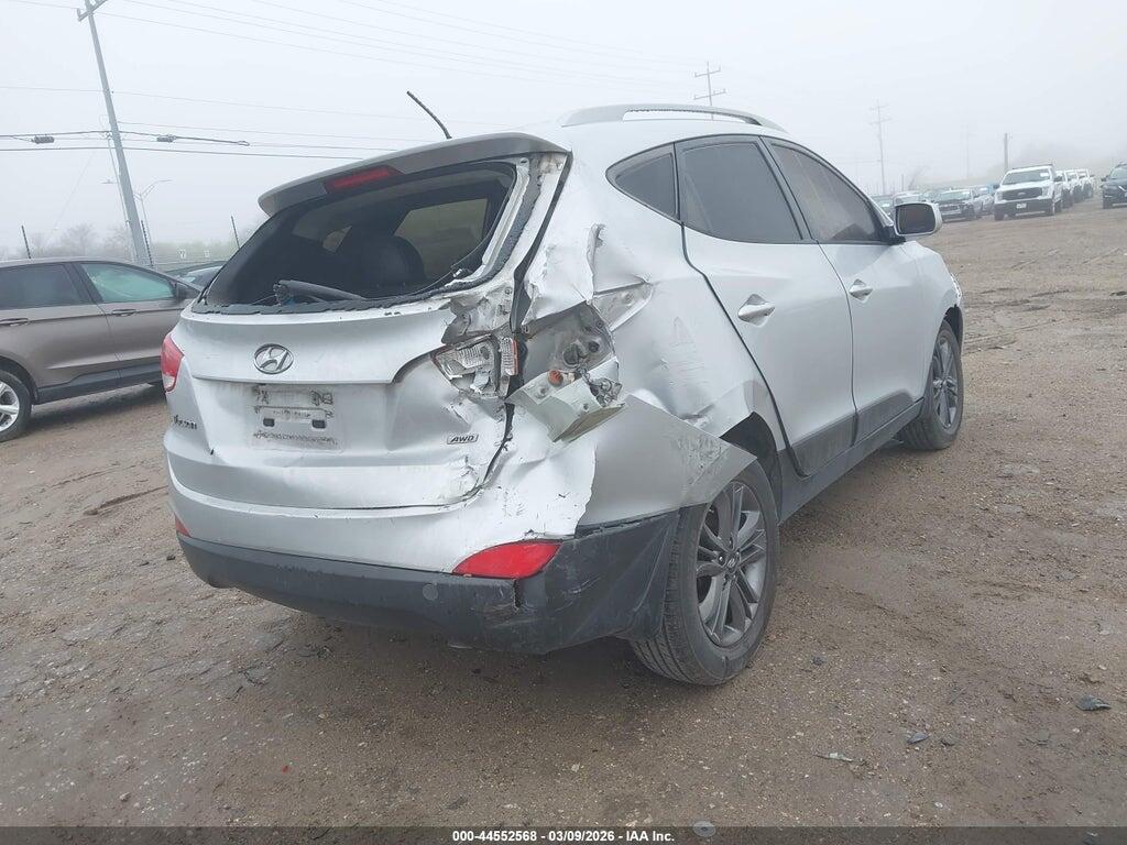 KM8JUCAG5EU826599 2014 HYUNDAI TUCSON photo no. 4