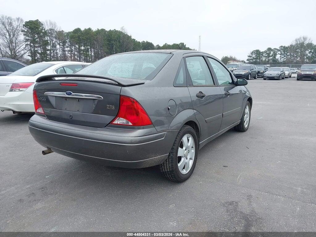 1FAFP383X2W141086 2002 FORD FOCUS photo no. 4