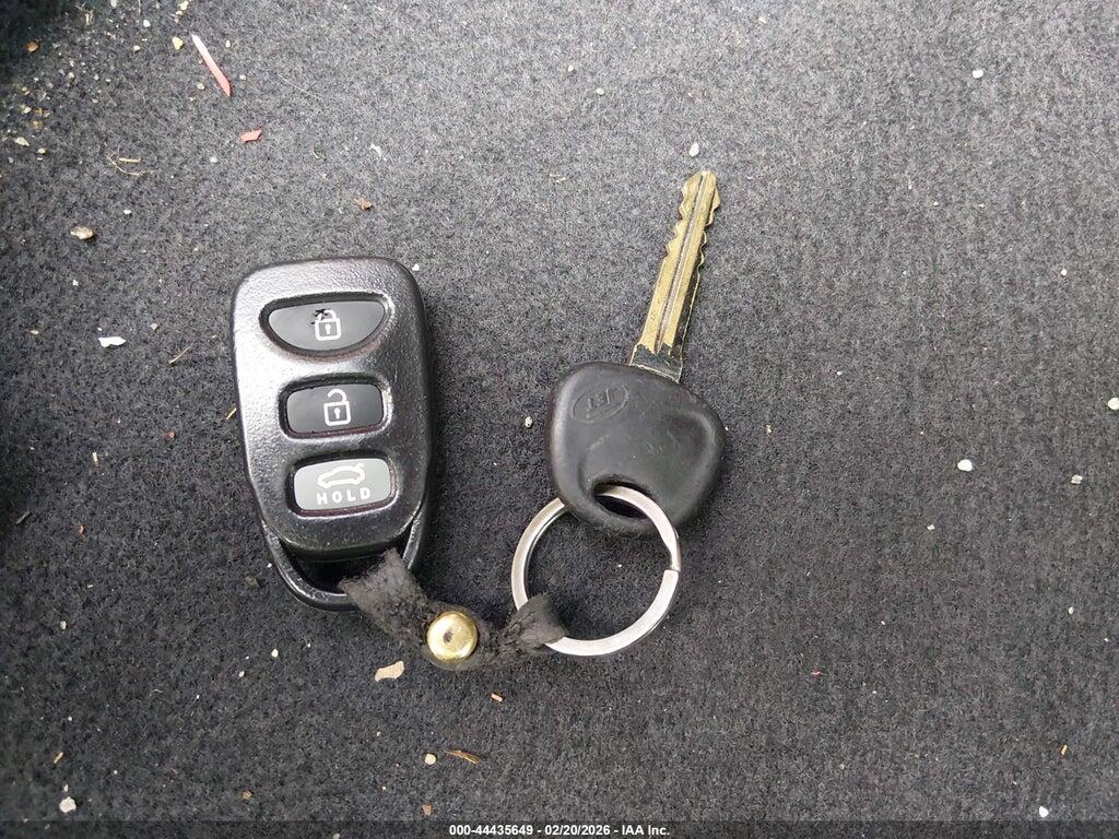 KNAFW6A3XA5278409 2010 KIA FORTE KOUP photo no. 11