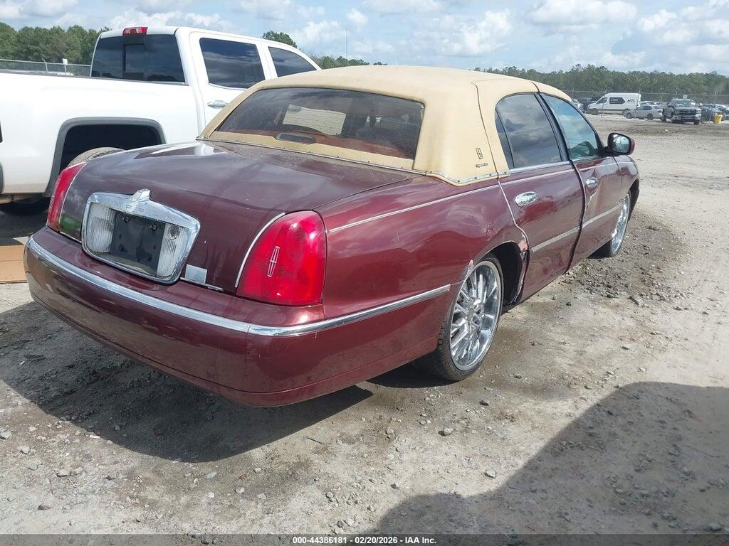 1LNHM82W9YY815765 2000 LINCOLN TOWN CAR photo no. 4