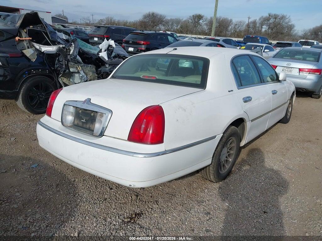 1LNHM82W8YY901892 2000 LINCOLN TOWN CAR photo no. 4