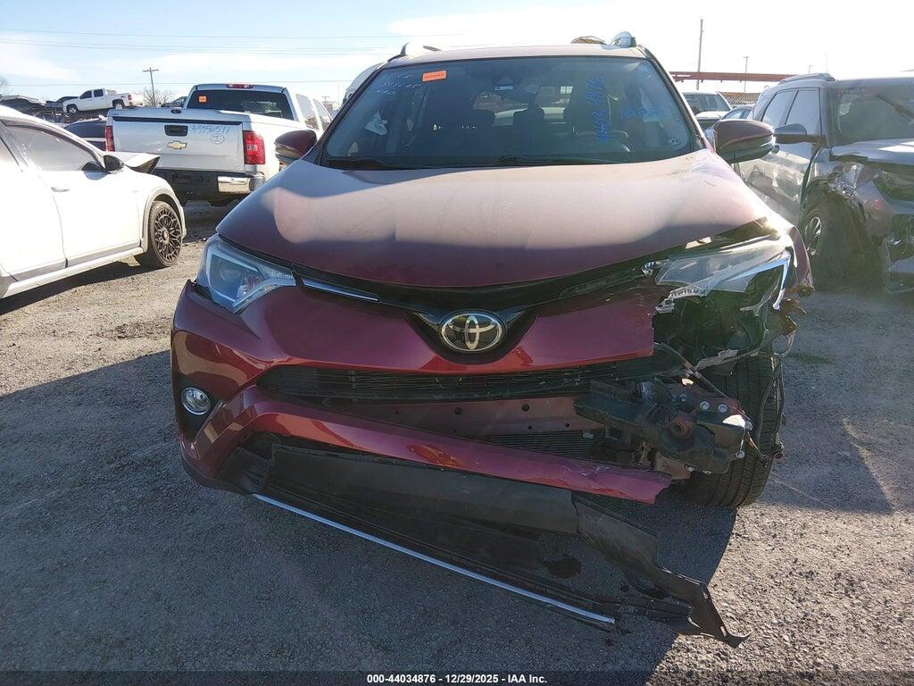 2T3RFREV8JW834870 2018 TOYOTA RAV4 photo no. 12