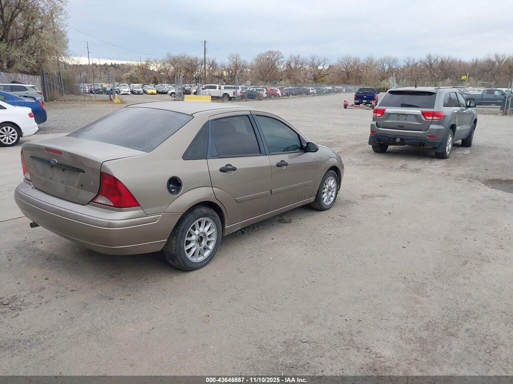 1FAFP34354W183111 2004 FORD FOCUS photo no. 4