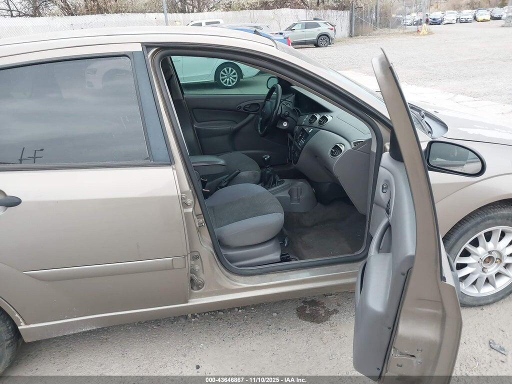 1FAFP34354W183111 2004 FORD FOCUS photo no. 5