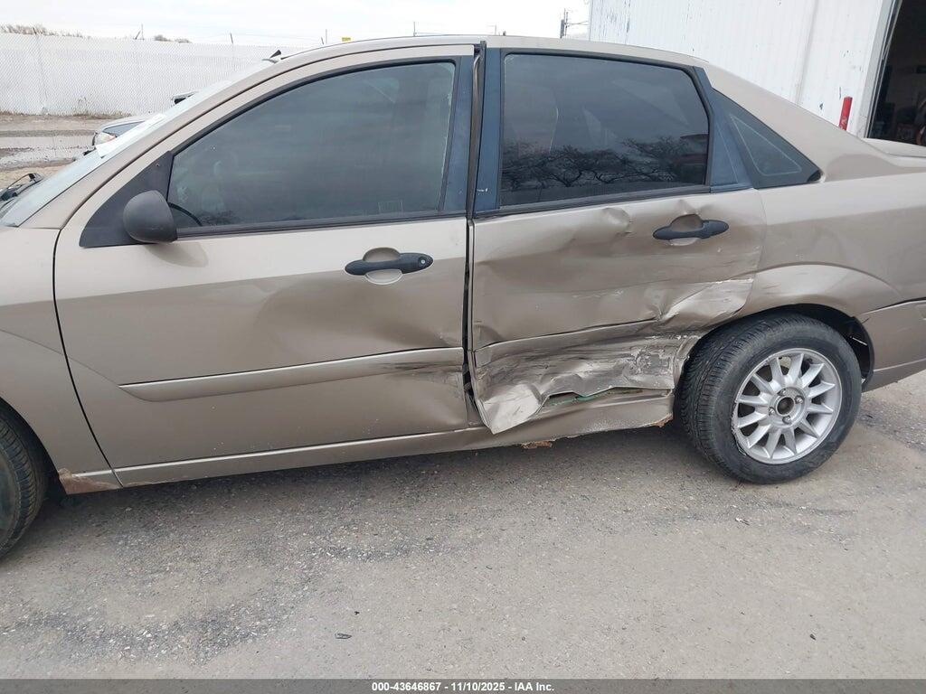1FAFP34354W183111 2004 FORD FOCUS photo no. 6