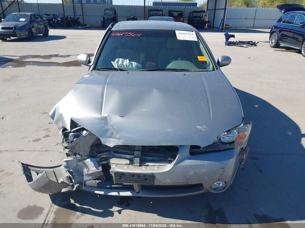 JN1DA31D42T400570 2002 NISSAN MAXIMA photo no. 12