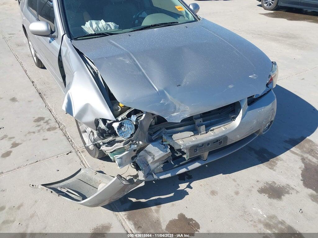 JN1DA31D42T400570 2002 NISSAN MAXIMA photo no. 6