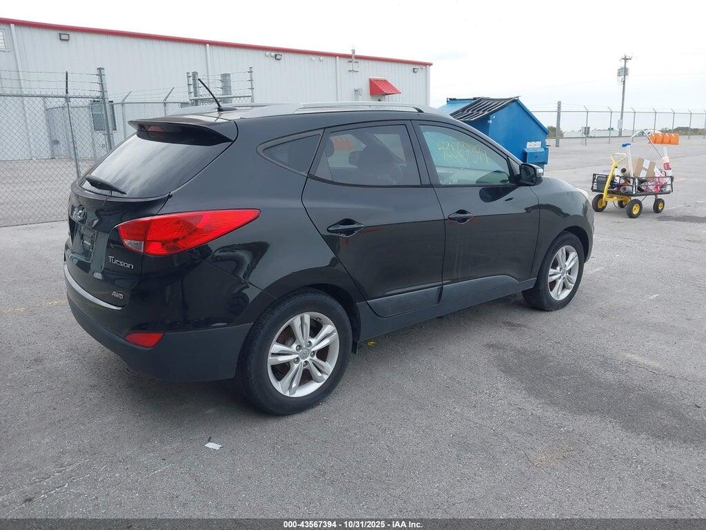 KM8JUCAC9DU726629 2013 HYUNDAI TUCSON photo no. 4